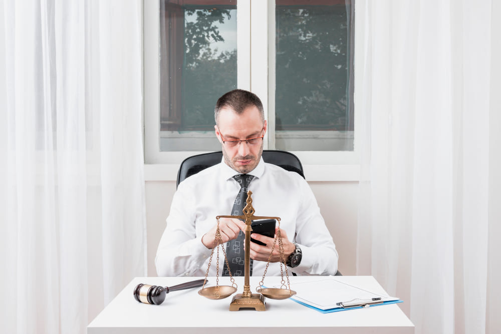Lawyer reviewing smartphone evidence